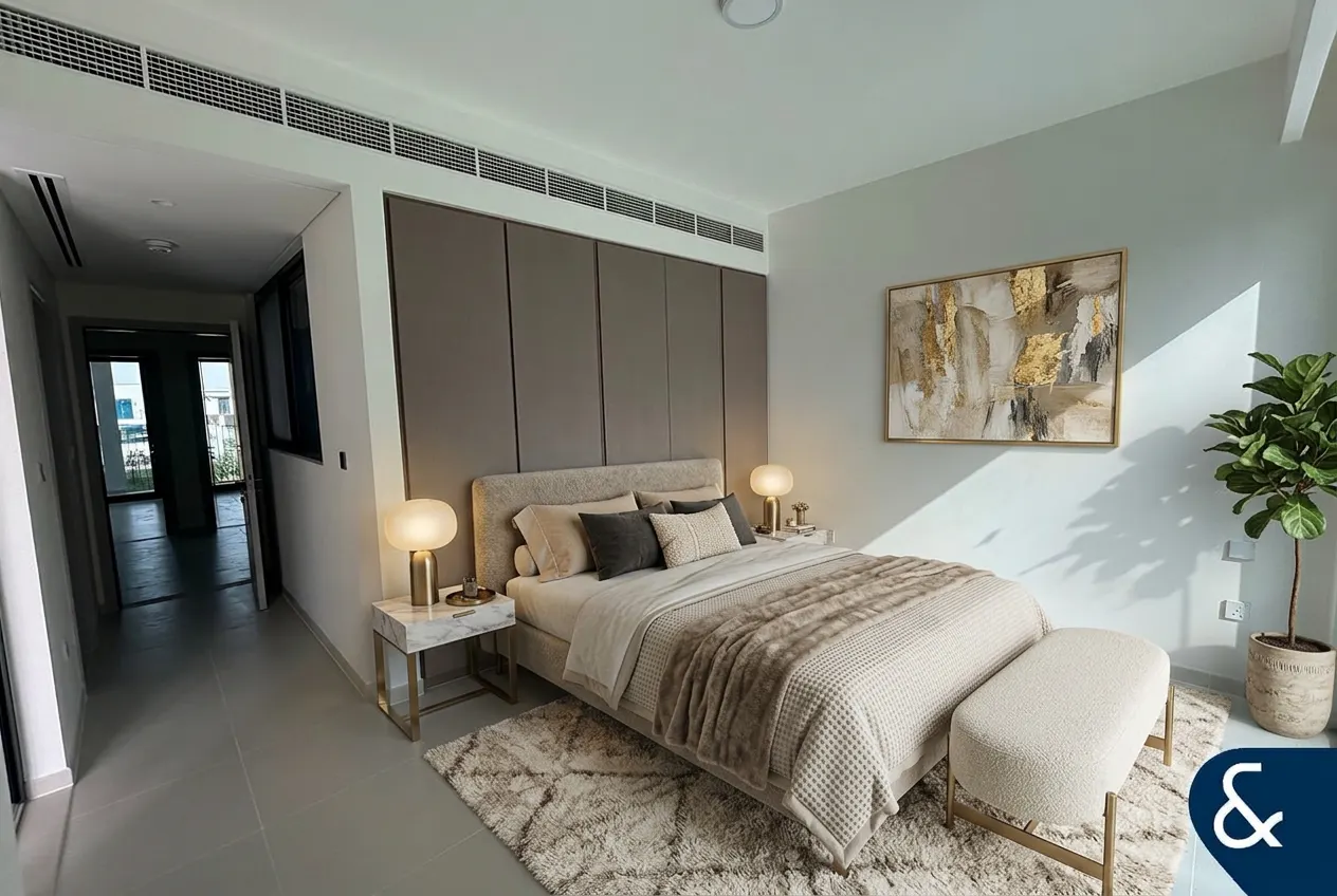 AI-generated visualisation of the bedroom of 3 bed villa to rent in Bliss 2, Bliss 2, Arabian Ranches 3, modern luxury: only the furnishings and lighting are changed, and the walls, windows, doors and size of the room are as in the listing photo. Not an actual listing photo